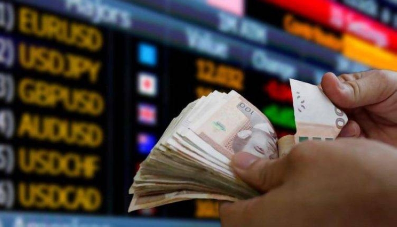 الدرهم يتحسن أمام الدولار ويحفز أذونات الاستيراد المؤجلة